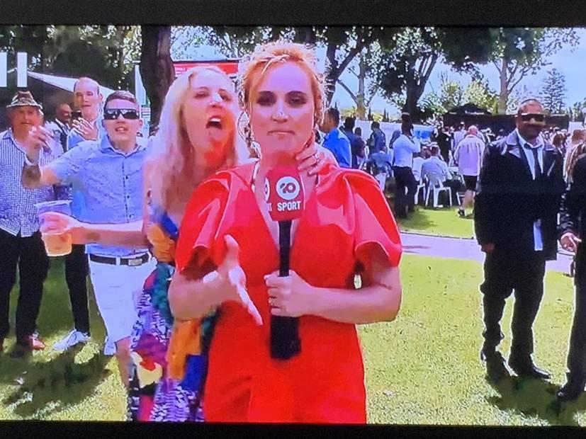 Racegoer tries licking Lee Steele's ear at Ascot in Perth 2020 for Melbourne Cup day